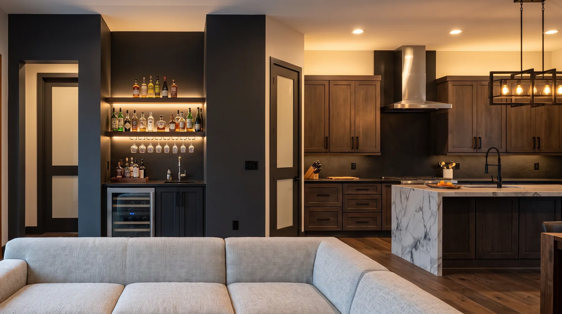 Great room with a built-in bar and open-concept kitchen